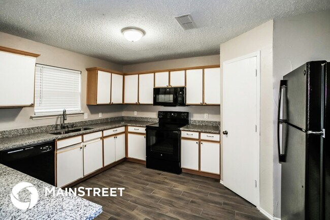 Foto del edificio - 1120 Springcreek Dr