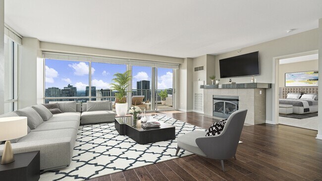 ¡Relájese frente a sus ventanas panorámicas o acurrúquese junto a su chimenea personal! - Flair Tower