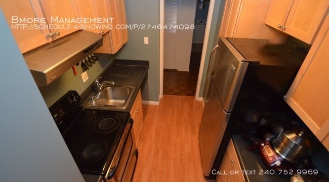 Building Photo - University One Condominium 1BR+den