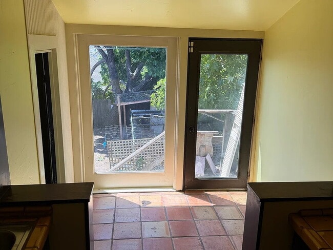 Building Photo - Freshly painted charming eccentric small Victorian house