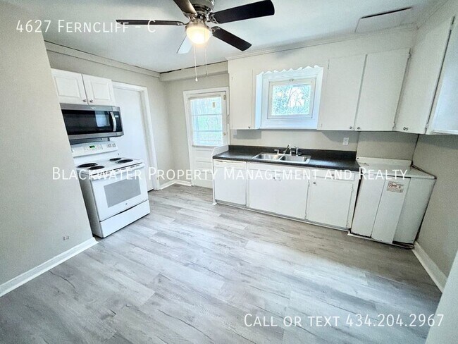 Building Photo - Move In Special! 1/2 Off Your First Full M...