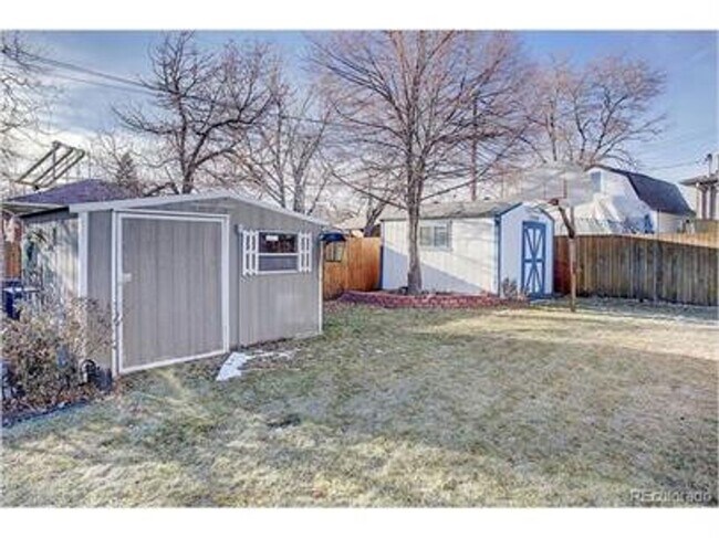 Building Photo - Updated clean and colorful 4 bed 2 bath ranch with a 2-Car garage!