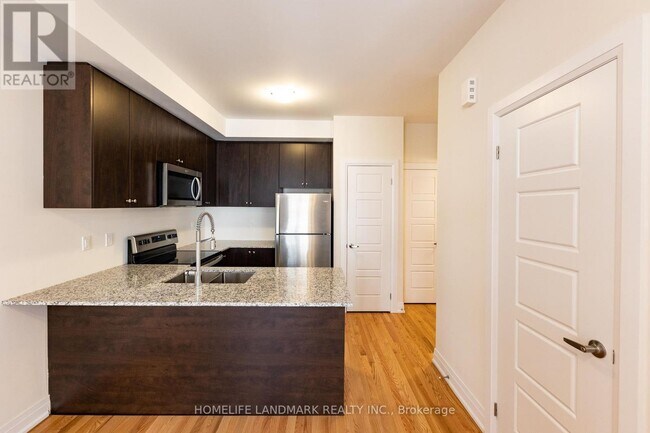 Building Photo - 717-717 Lawrence Ave W