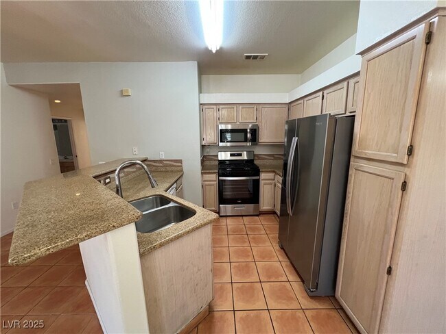 Foto del edificio - 5415 W Harmon Ave