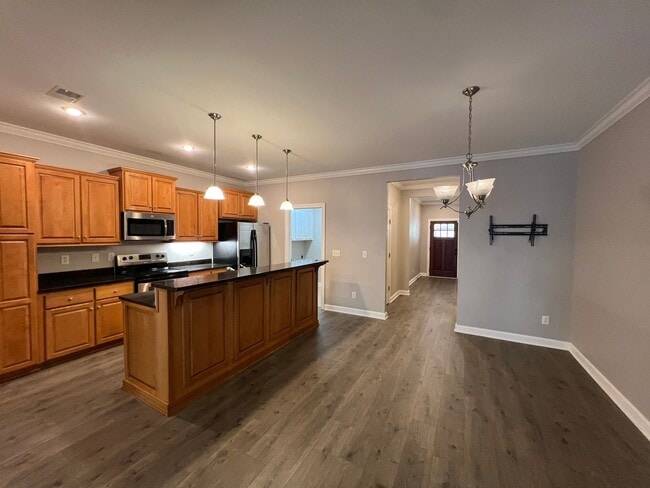 Building Photo - Spacious 3-Bedroom Townhome in The Retreat...