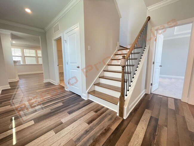 Building Photo - Beautiful 4 Bedroom 2.5 Bath Home with 2 Car Rear Entry Garage, First Floor Primary Bedroom Suite...