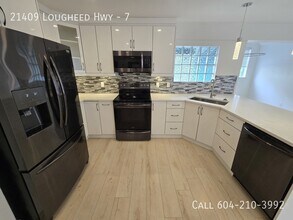 Building Photo - 21409 Lougheed Hwy.