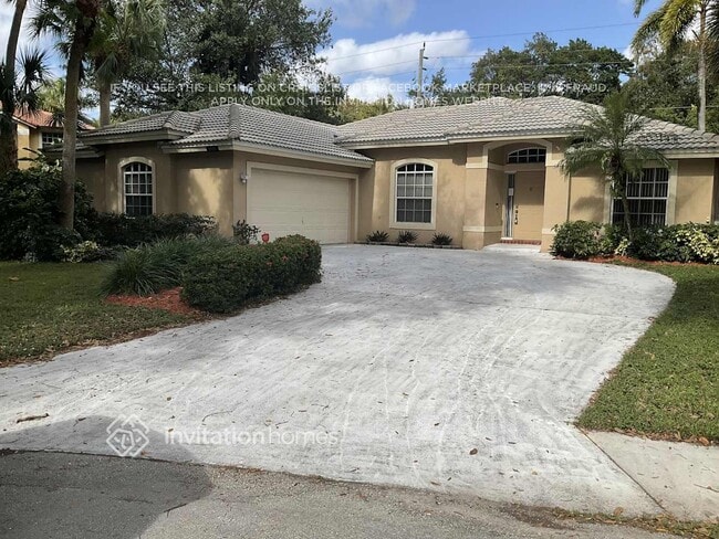 Building Photo - 6525 NW 54th Ct