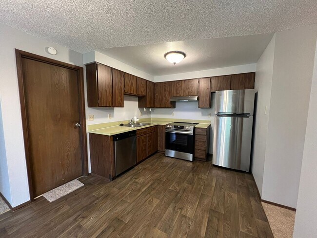 Building Photo - New Paint & Flooring! (Water & Garbage Included)