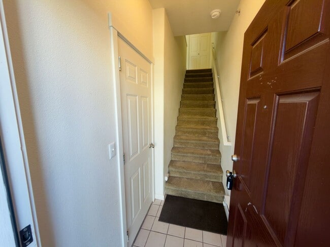 Building Photo - Gorgeous Tri-Level Condo at Progress Ridge — Lake Views!