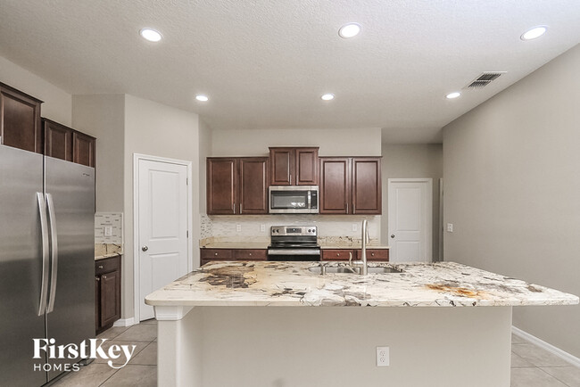Building Photo - 10224 Strawberry Tetra Dr