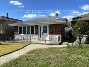 Building Photo - 7522 S Lockwood Ave