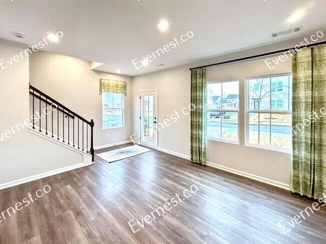Building Photo - Spacious & Bright 3-Bedroom Townhome with ...