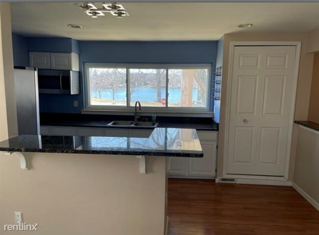 Foto del edificio - 5 br, 2 bath House - 6458 Lotus Ct