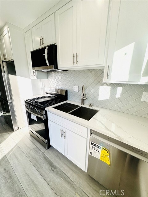 Building Photo - 9318 Encino Ave