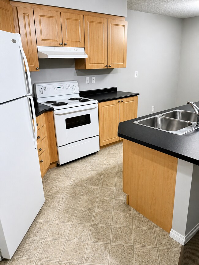 Photo du bâtiment - 2624-2624 Mill Woods Rd E