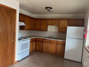 Building Photo - 1000 Wild Rose Ln
