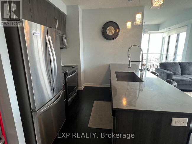 Photo du bâtiment - 4011-4011 Brickstone Mews