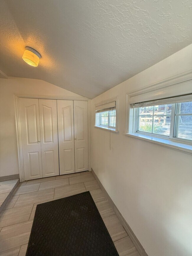 Building Photo - Timeless Charm, Modern Living — 4-Bed Gem ...