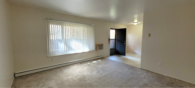 Building Photo - 2-Bedroom Garden-Level Unit | Parking, Patio & Water Included