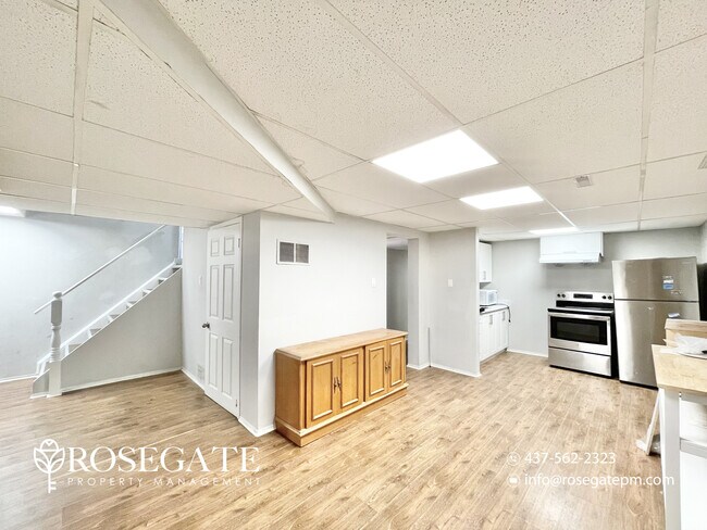 Photo du bâtiment - Bright & Modern 2-Bedroom Basement with Pa...