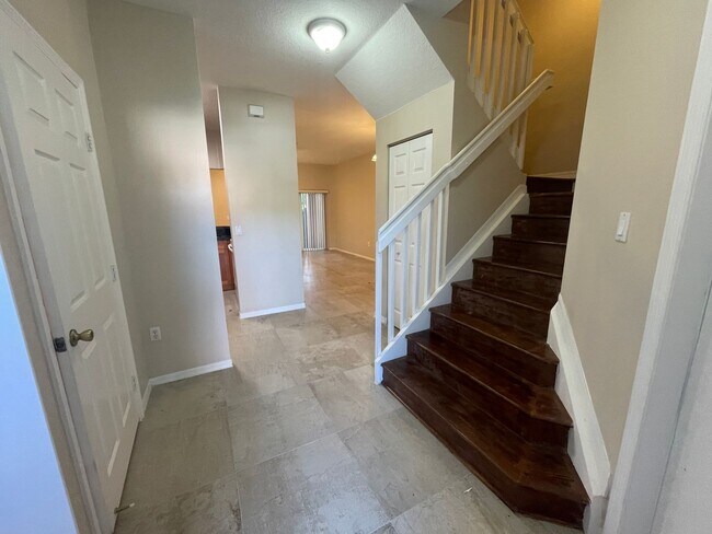 Building Photo - Pembroke Pines Paradise: Luxe 2-BR/2.5-Bat...