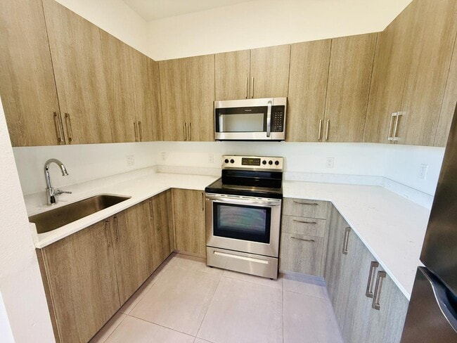 Photo - 1295 W 69th St Apartment