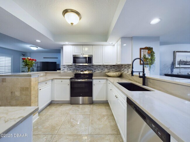 Foto del edificio - 4670 Links Village Dr