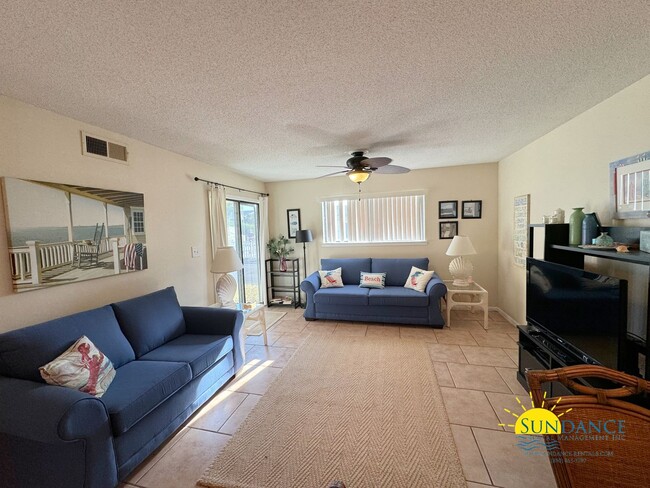 Building Photo - Welcome to your ideal furnished beach retr...