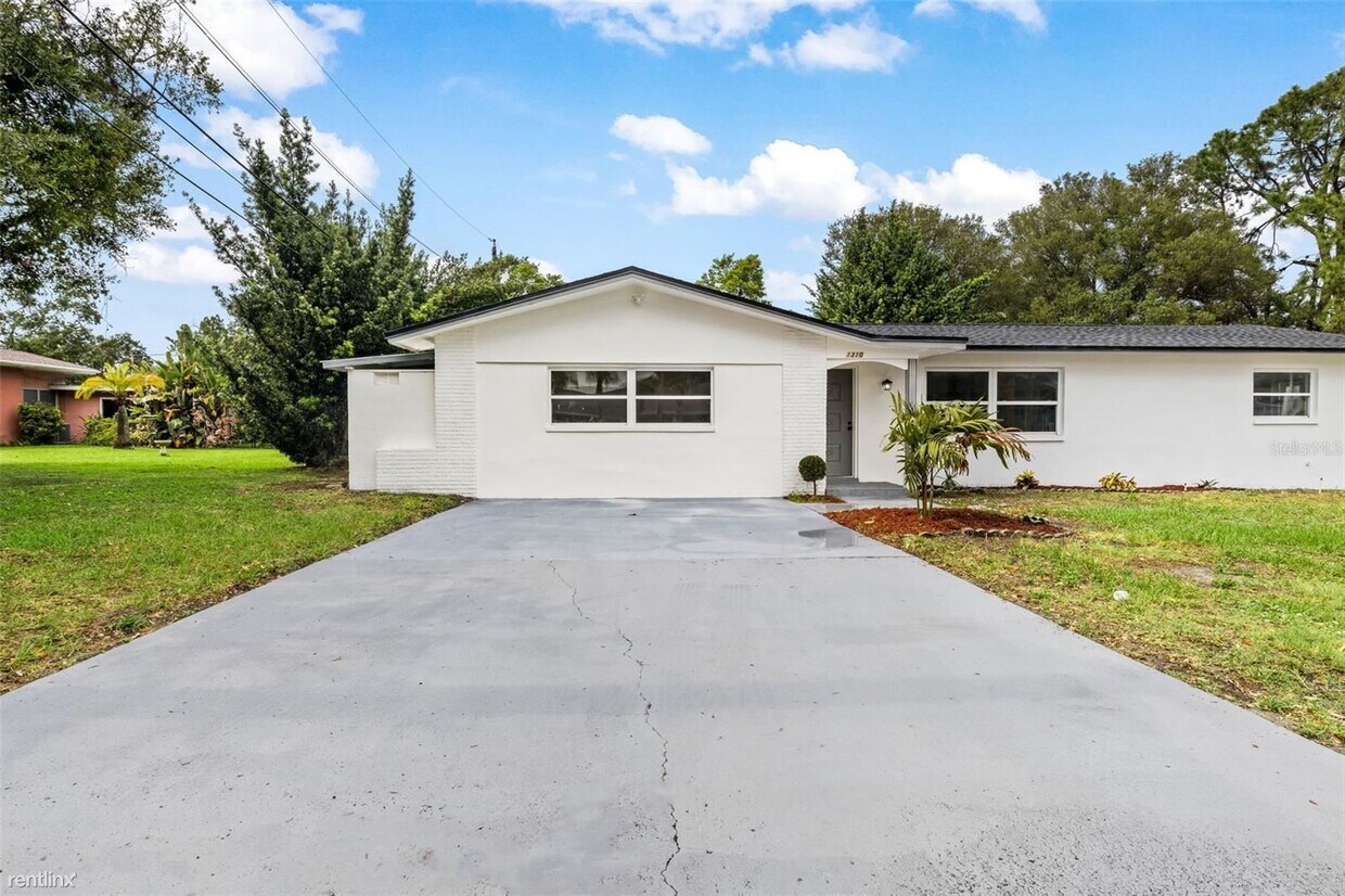Foto principal - 4 br, 2 bath House - 1310 R Rosery Road NE