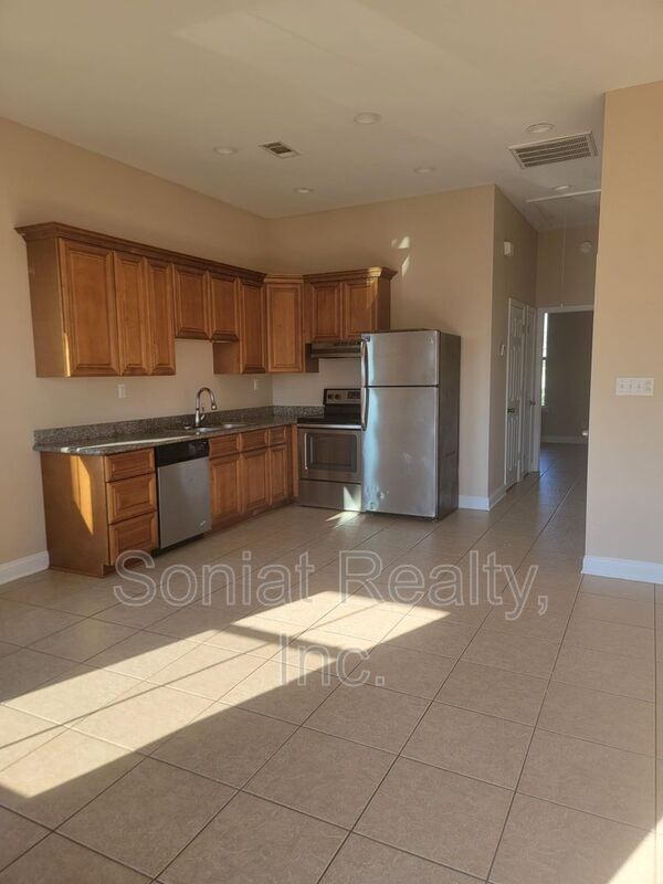 Foto del edificio - 6060 Wickfield Dr