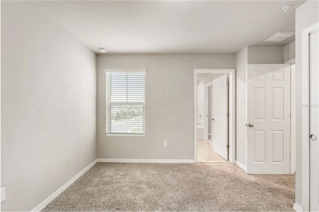 Foto del edificio - Charming 3-Bed Oasis in Ocoee: Spacious 1574 sq. ft. Townhouse with 2.5 Baths!