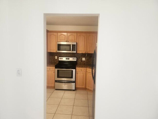 Foto del edificio - 3813 Coral Tree Cir