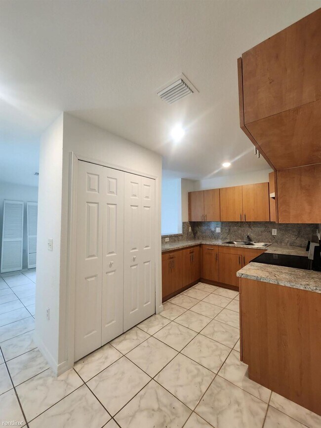 Building Photo - 4 br, 2 bath House - 7601 NW 20th Ave Exce...