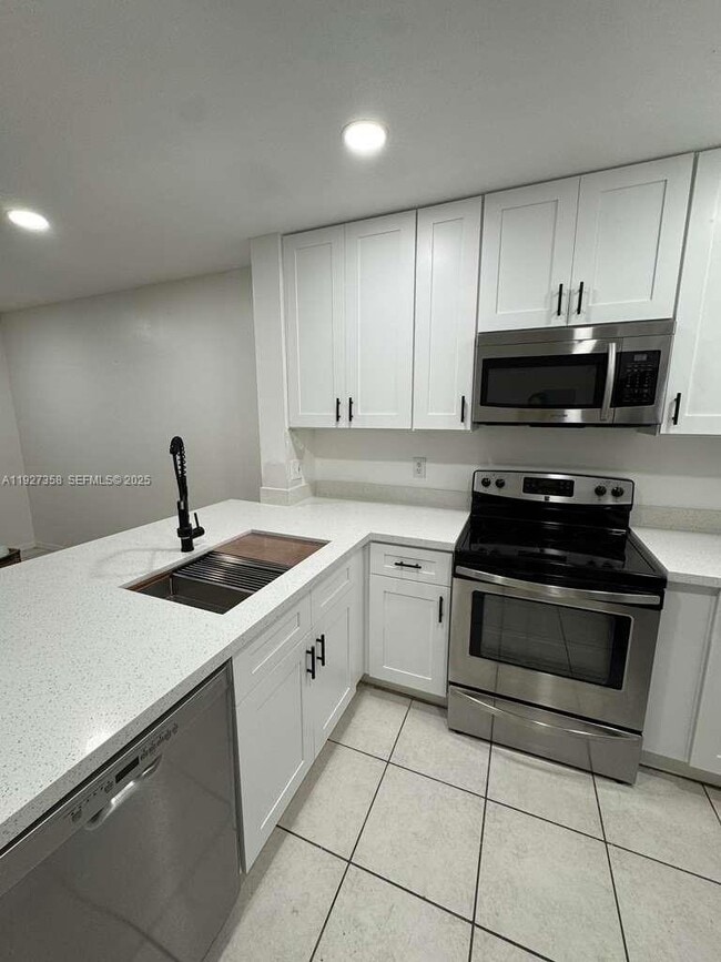 Building Photo - 12605 SW 54th Ct