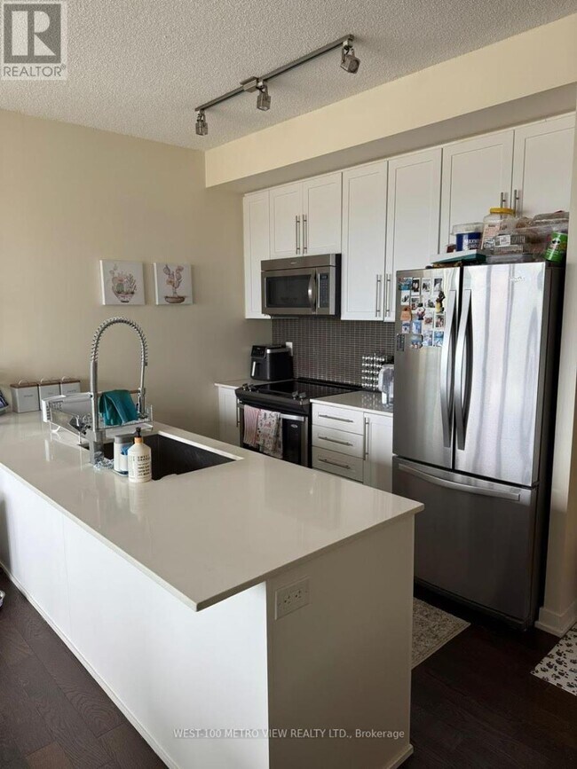 Photo du bâtiment - 510-2510 Curran Place