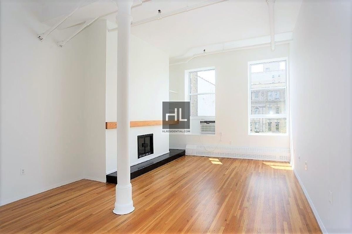 Building Photo - West Village Pre-War 1BR with wood burning...