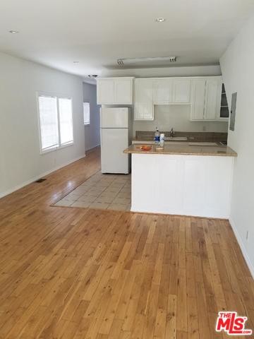 Living room with hardwood floor - 1631 Morton Ave
