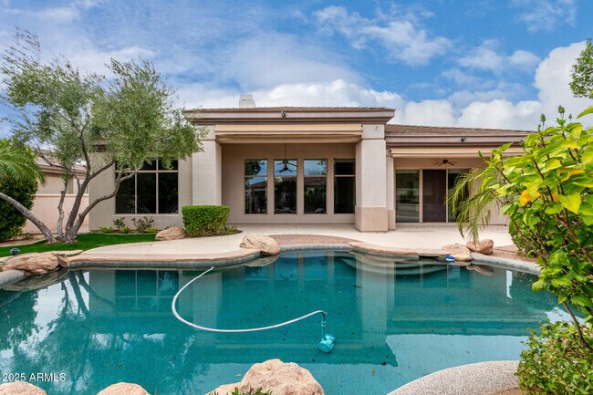 Building Photo - 8317 E Feathersong Ln