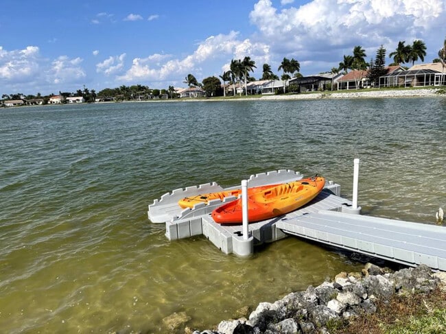 Property comes with dock access. Kayaks not included. - 7311 Mill Pond Cir