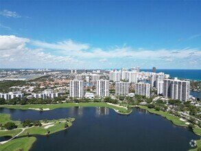 Building Photo - 3675 N Country Club Dr