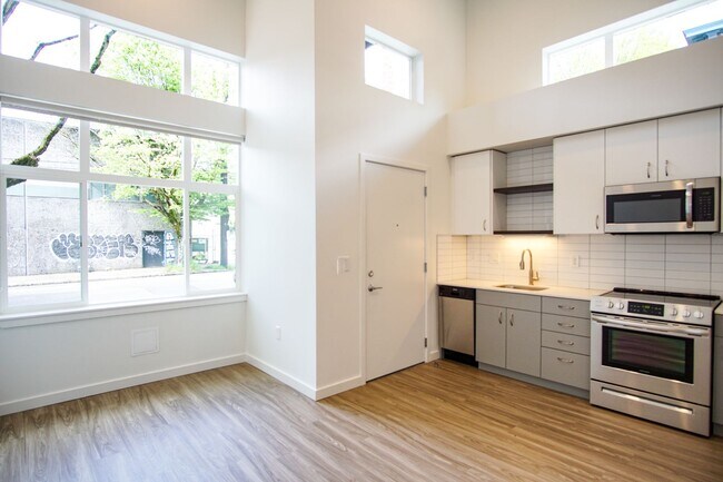 Building Photo - Modern & Chic 1-Bedroom w/Condo-Grade Finishes!