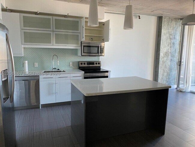 Building Photo - 690 SW 1st Ct