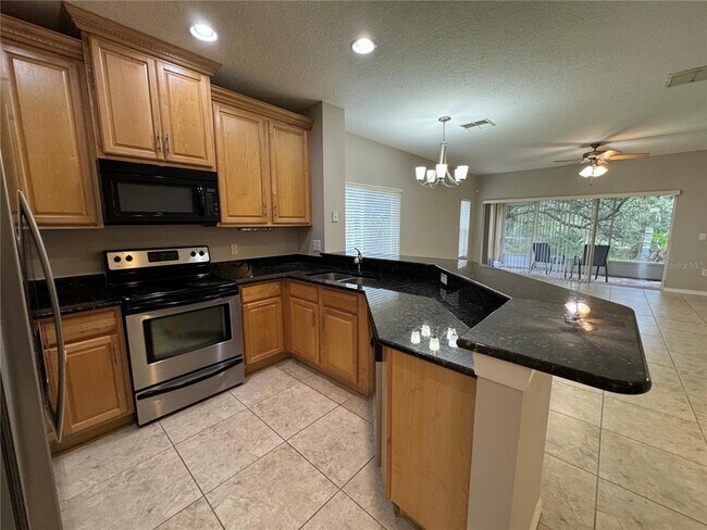 Foto del edificio - 8552 Trail Wind Dr