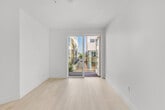 Located at 5570 Rosemead Blvd in Temple City, California, this contemporary space offers a clean, minimalist design that maximizes both light and functionality. The interior room is finished with smooth white walls and light-toned hardwood flooring that lends a warm, airy feel to the space. Recessed lighting in the ceiling complements the abundant natural light that pours in through a large sliding glass door, which serves as the seamless transition point between the interior and the outdoor area.

Stepping through the sliding door leads directly onto a generous rooftop terrace finished with wood-look porcelain tile flooring, creating a cohesive and stylish outdoor environment. The terrace is enclosed by stucco parapet walls and offers an expansive, unobstructed panoramic view of the surrounding Temple City neighborhood, with a striking mountain backdrop visible on the horizon. Palm trees, rooftops, and open sky stretch out in every direction, providing a truly elevated outdoor living experience.

The overall ambiance of the space is bright, open, and modern, with a neutral color palette throughout both the interior and exterior areas. The thoughtful integration of indoor and outdoor spaces, combined with the exceptional rooftop views, makes this a uniquely appealing and versatile setting in the San Gabriel Valley.