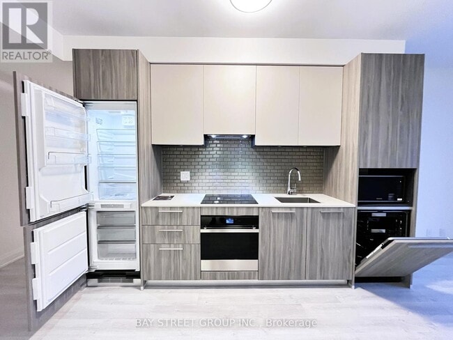 Photo du bâtiment - 65 Broadway Ave