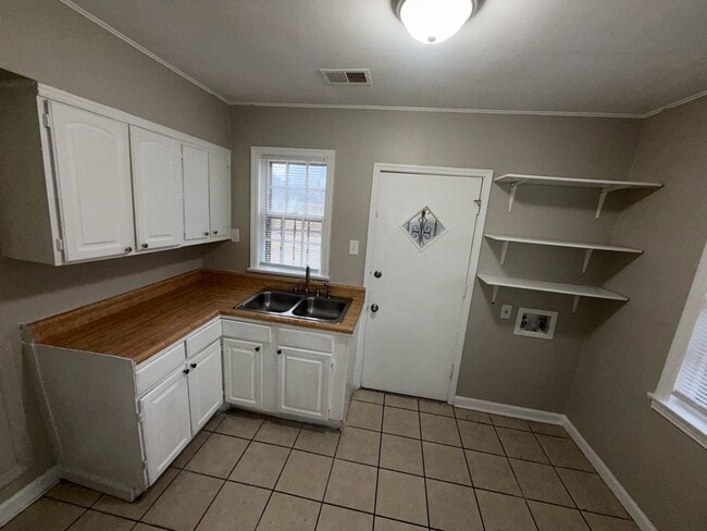 Photo - Charming 3-Bed, 1-Bath Home with Spacious Yard