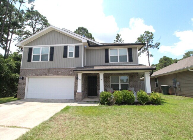 Building Photo - Spacious 5-Bedroom Home Near NAS with Move...