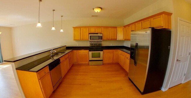 Building Photo - West Side + Fenced-in Yard + Attached 2-Ca...