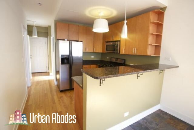 Foto del edificio - 3023 N Oakley Ave